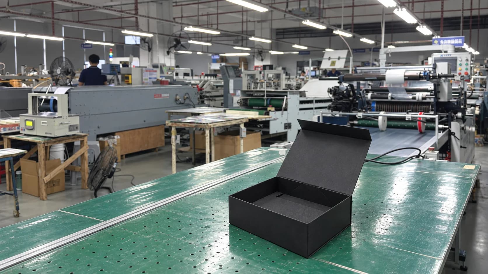 Open magnetic rigid gift box displayed inside the Baoxinglong postpress factory