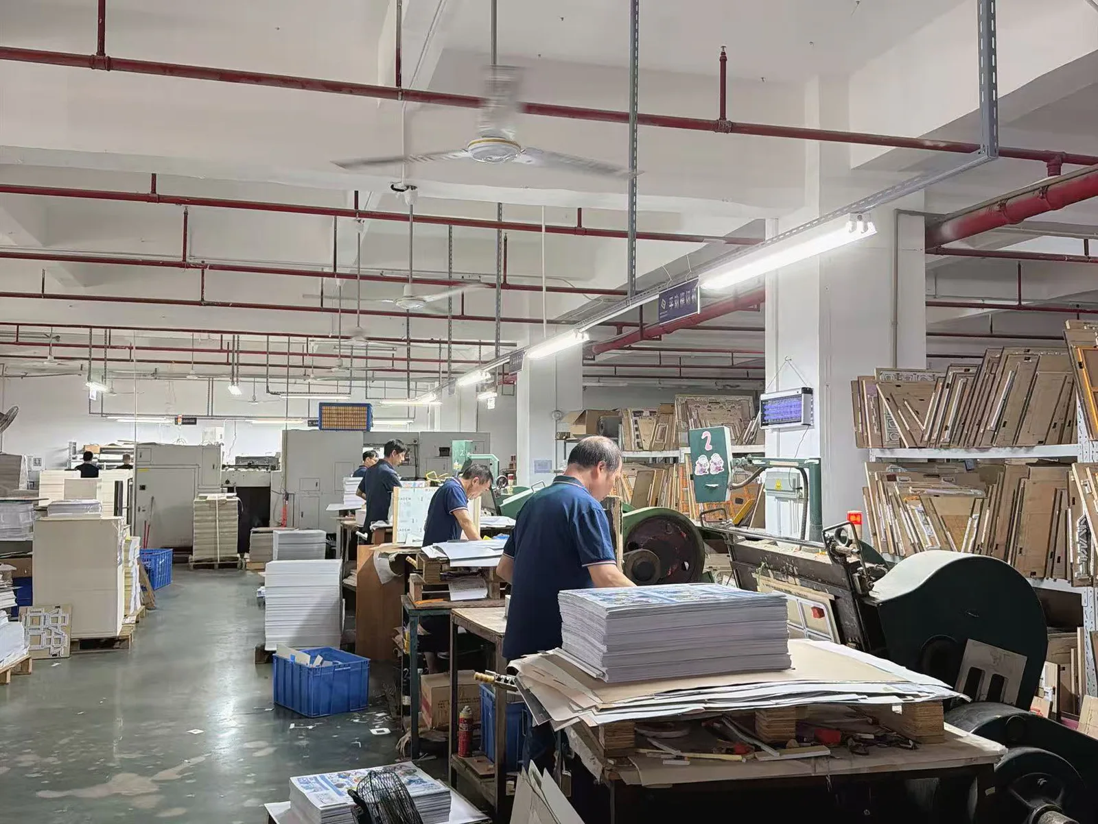 Die-cutting workshop with racks of cutting dies